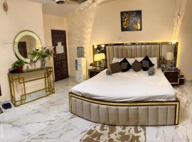 Charming Home banglow, ξενοδοχείο στο Καράτσι