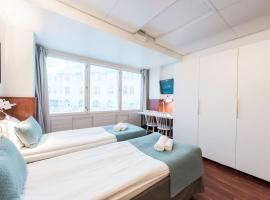 Forenom Aparthotel Helsinki Kamppi - contactless check-in, hotel di Helsinki