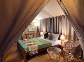 AT ONE - with Nature Glamping Resort, hotel in Rekawa