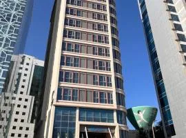 سي - فندق وأجنحة الدوحة