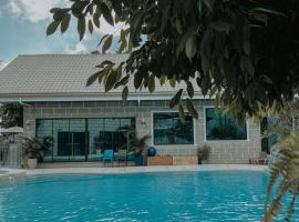 Casa Vista by Hooga Home Bungalow Guest House, hotell sihtkohas Talisay