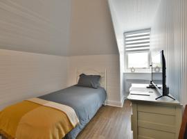 Chambre 302 de l'hôtel Victoria confortable et moderne, hotel in Saint-Pascal