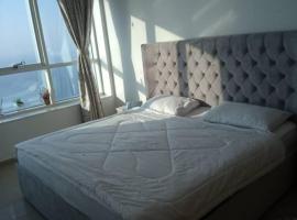 NICE Room in Sea View Apartment with Shared Amenities - ROOM INSIDE APARTMENT, hotel in Ajman 