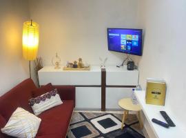 Quarto salinha e WC, hotel v Lubangu