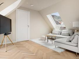 Dinbnb Apartments I Mid-City Luxury with Mini Balcony and Smart TV & Sound System, hotel in Bergen