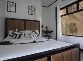 The Palms Resort & Bar,位于San Narciso的酒店