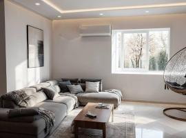 Superbe Etage Villa avec balcon, BBQ, ξενοδοχείο σε Oulad Maʼammar