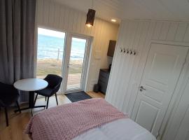 Sauðá Guesthouse، فندق في هفامستانغي