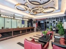 Baiyun Airport Penguin international hotel & included free shuttle bus,位于Yinghai的酒店