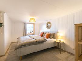 Skandi Lodge mit Seesicht nahe Interlaken, hotel v destinaci Leissigen