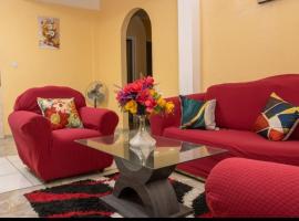 Cozy Apartments And Car Rentals, hotel en Canefield Airport