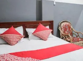 OYO 93117 Penginapan Tiga Dara