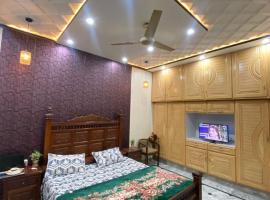 Gulistan Inn, hôtel à Faisalabad