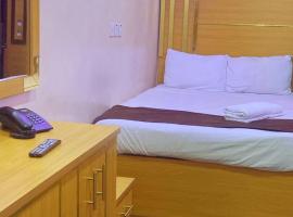 K&C Royal suits and event center, hotel in Mama