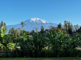 Shose Farmhouse Chalets & Campsite, hotelli kohteessa Moshi