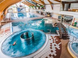 होटल की एक तस्वीर: Hotel i Aquapark Olender