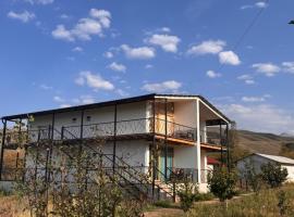 Eco Village Lodge โรงแรมในDzhetyoguz