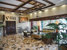 Oasis Hotel, hotel en Ángeles
