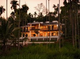 The Calm County Homestay, hotel in Mānantoddy
