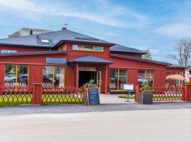 Slottsgården Hotell & Restaurang, хотел в Вадстена