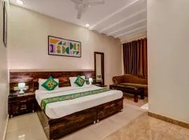 Treebo Riddhi Paradise - 15 mins from Airport