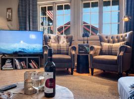 Beitostølen! Midt i sentrum! Ski in ski out! Badstue-Massasjedusj-Steamdusj, hotel in Beitostøl