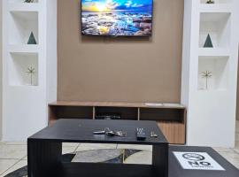 Piarco에 위치한 호텔 Your Layover - 6 Mins from the Airport, Equipped for Long Stays