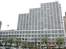 होटल की एक तस्वीर: Guangzhou Jinzhou Hotel