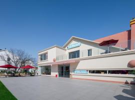 Shanghai Dolemi Mengmengwu Hotel, hôtel à Shanghai