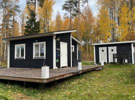 A simple stuga on a lake incinerating toilet in a separate building next to the cabin Water for drinking and washing hands dishes comes from two containers that attach to a faucet through a simple electric pump OBS no shower on site, hotel in Grythyttan