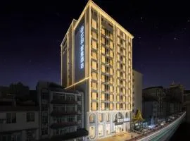 Yunbo Curie Hotel - Xishuangbanna Jinghong Gaozhuang Xishuangjing Starry Night Market Branch