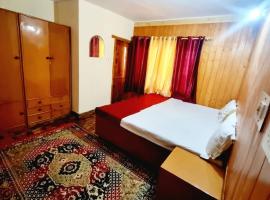 Snow land cottage, hotel in Manāli