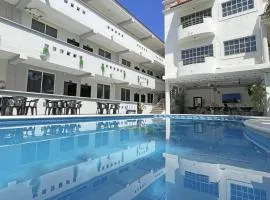 Hotel Balxibá alberca y estacionamiento