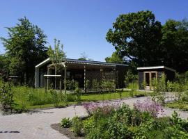 Luxury holiday home surrounded by water and forest, Hotel in Sint Nicolaasga