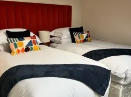 The courtyard bar, kitchen, rooms