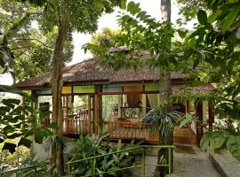 होटल की एक तस्वीर: Ambong Rainforest Retreat
