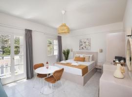 Palos Luxury Suites, ξενοδοχείο στο Κίνι