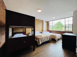 Acogedor Loft Rústico con Vista al Volcán, מלון בבאניוס