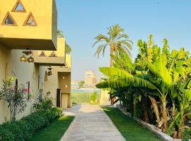 Nile Compound Garden, ξενοδοχείο σε Al Aqālitah