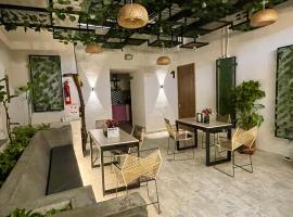 Nómada22 -Hostal moderno en el centro de Neiva, hotel in Neiva