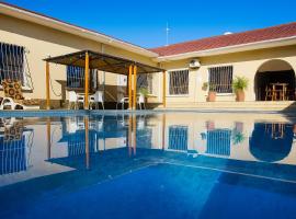BOUGAINVILLA Boutique Hotel & Restaurant, hótel í Lubumbashi