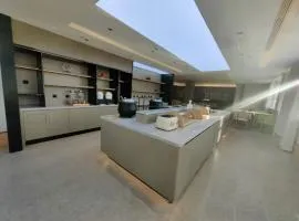 万信至格酒店库尔勒二师医院新四中店