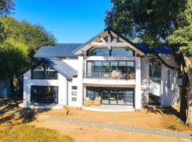 Tapologo River Lodge，位于Baines Drift的酒店