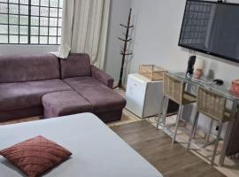 Aconchegante quarto no centro da cidade, hotel in Curitiba