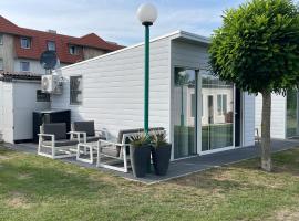 Coester Colorado - Cozy cottage for two, hotel en De Haan