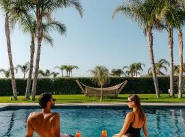 TAF Villas Beach Resort with TESLA