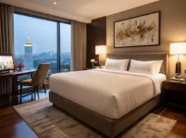 Roomsity Pride Inn Plaza