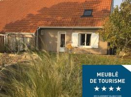 Maison spacieuse avec jardin et feu de bois et parking gratuit pour 3 voiture, hotel in Le Crotoy