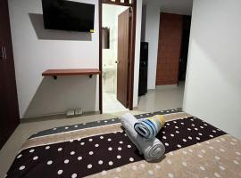 Tayra Living Suites, отель в городе Мокоа