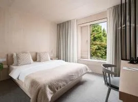 Hotel Bergamo Modern & zentral in Ludwigsburg 24h Check in 3 Min zum Schloss nachhaltiges Hotel in Holzbauweise